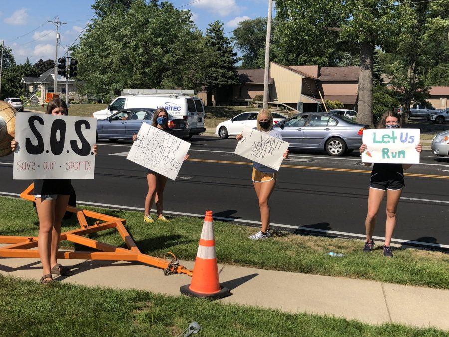 Students made signs to protest at the Board of Education Meeting on Monday, August 10 in support of practicing sports this fall season.